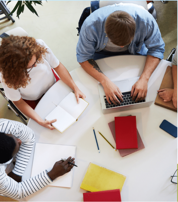 A team working around a round table. 